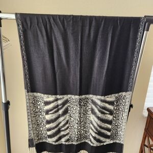 Black with animal.pirinting on the bottom.